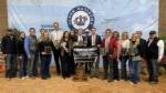 17 people standing with awards